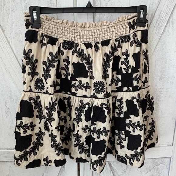 Anthropologie Dresses & Skirts - ANTHROPOLOGIE A-Line Flounce Mini Skirt Size M Embroidered Floral Black Tan